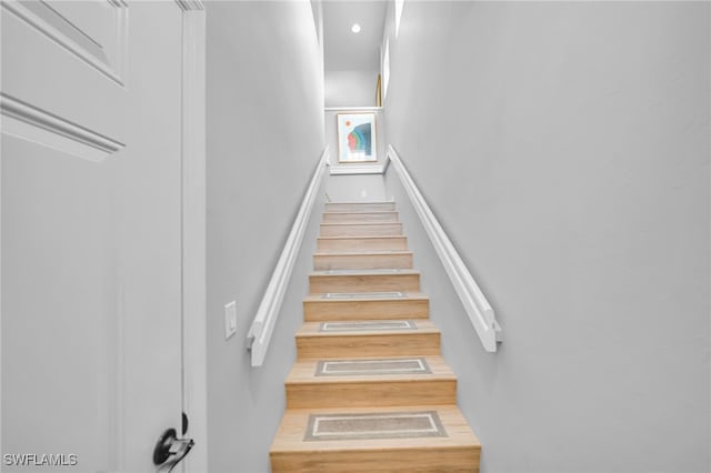 9636 Hemingway Ln Unit 4201, Fort Myers, FL 33913 - staircase with a high ceiling and recessed lighting