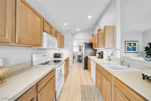 9636 Hemingway Ln Unit 4201, Fort Myers, FL 33913 - kitchen with white appliances, light wood-style flooring, light countertops, recessed lighting, and vaulted ceiling