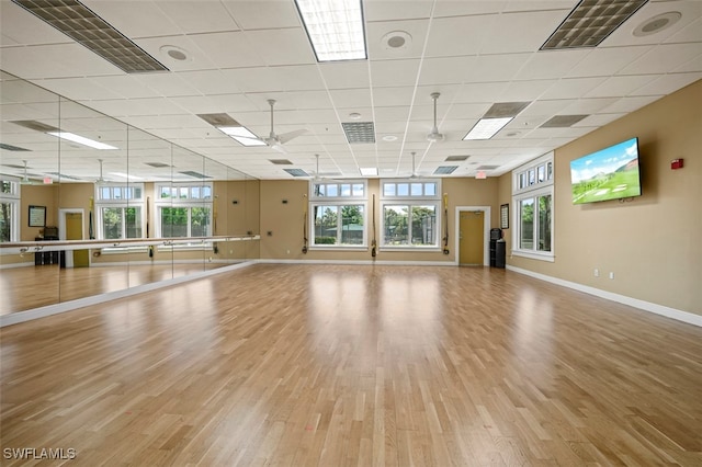 9636 Hemingway Ln Unit 4201, Fort Myers, FL 33913 - workout room with light wood-type flooring, plenty of natural light, and a paneled ceiling