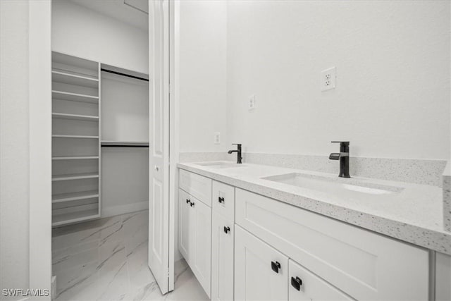 448 Majors Ave S, Lehigh Acres, FL 33974 - full bathroom with marble look tiles and double vanity