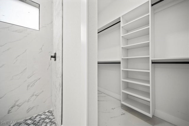 448 Majors Ave S, Lehigh Acres, FL 33974 - walk in closet featuring marble finish floors