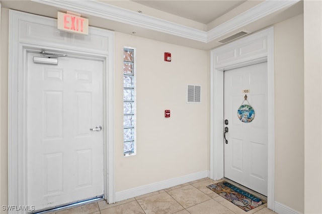 3939 Pomodoro Cir Unit 103, Cape Coral, FL 33909 - entryway featuring light tile patterned flooring and crown molding
