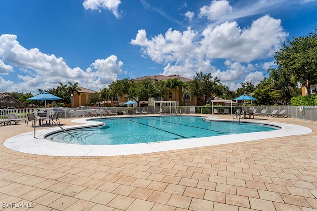 3939 Pomodoro Cir Unit 103, Cape Coral, FL 33909 - community pool featuring a patio