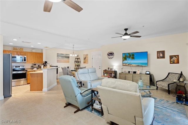 3939 Pomodoro Cir Unit 103, Cape Coral, FL 33909 - living area featuring ceiling fan, light tile patterned flooring, recessed lighting, and a chandelier