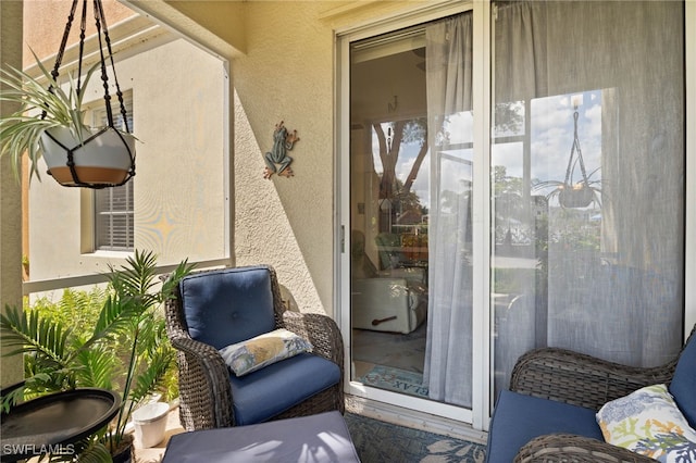 3939 Pomodoro Cir Unit 103, Cape Coral, FL 33909 - property entrance featuring stucco siding and a balcony