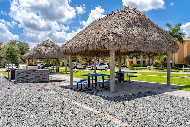 3939 Pomodoro Cir Unit 103, Cape Coral, FL 33909 - view of property's community featuring a gazebo and a yard