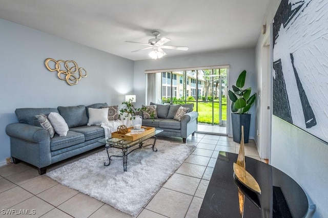 168 Pebble Shores Dr Unit 102, Naples, FL 34110 - living area featuring light tile patterned floors and a ceiling fan