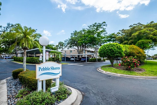 168 Pebble Shores Dr Unit 102, Naples, FL 34110 - view of asphalt road with curbs