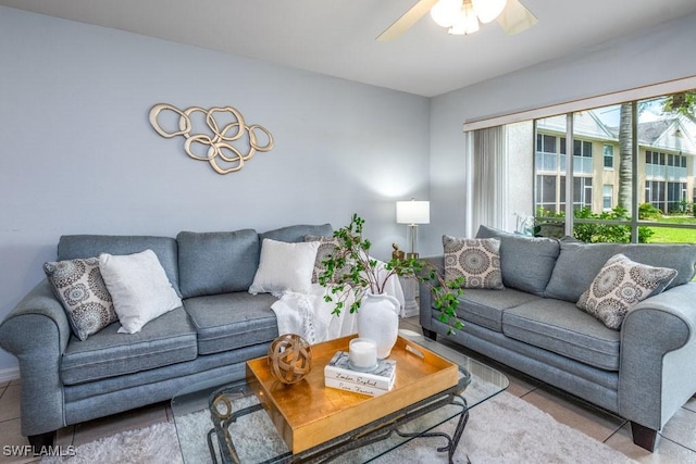 168 Pebble Shores Dr Unit 102, Naples, FL 34110 - tiled living area featuring a ceiling fan