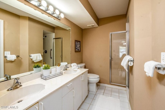 168 Pebble Shores Dr Unit 102, Naples, FL 34110 - full bath with a stall shower, double vanity, and tile patterned flooring