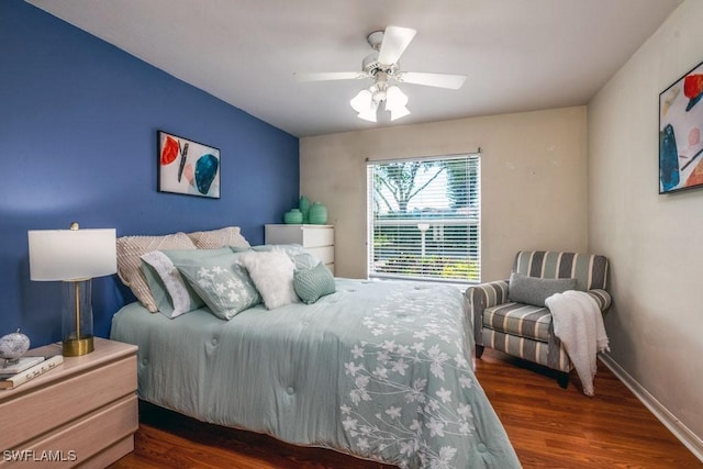 168 Pebble Shores Dr Unit 102, Naples, FL 34110 - bedroom with wood finished floors and a ceiling fan