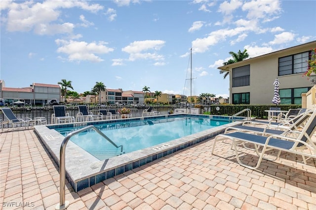 4001 SE 19th Pl Unit B1, Cape Coral, FL 33904 - community pool featuring a patio area