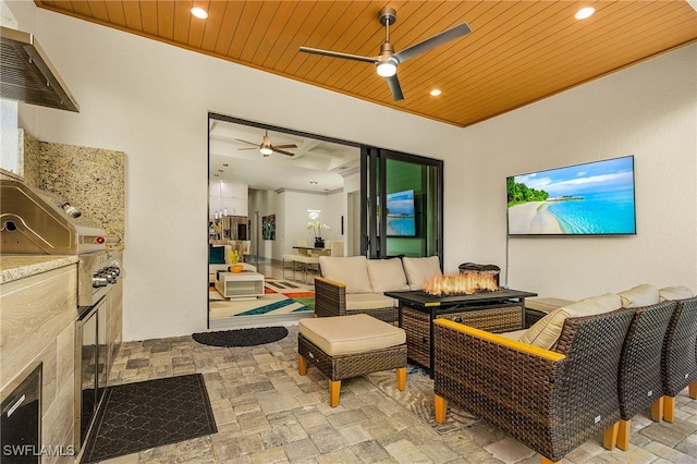614 105th Ave N, Naples, FL 34108 - view of patio featuring an outdoor living space with a fire pit and a ceiling fan