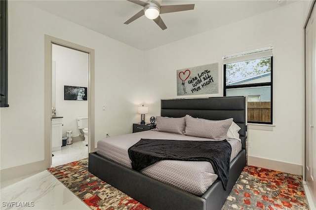 614 105th Ave N, Naples, FL 34108 - bedroom with ensuite bath and ceiling fan