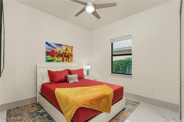 614 105th Ave N, Naples, FL 34108 - bedroom with marble finish flooring and ceiling fan