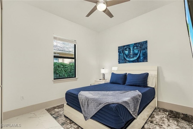614 105th Ave N, Naples, FL 34108 - bedroom featuring marble look tile flooring and a ceiling fan