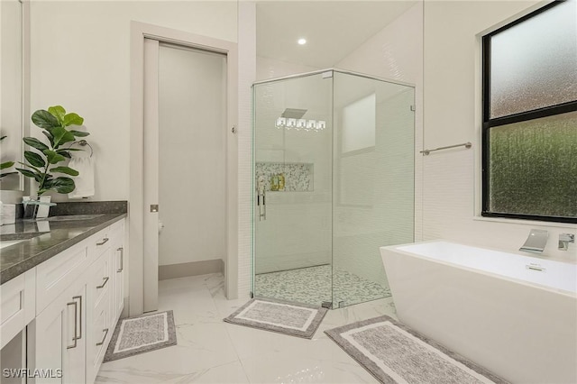 614 105th Ave N, Naples, FL 34108 - bathroom featuring a stall shower, a freestanding tub, vanity, marble finish floors, and recessed lighting