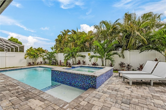614 105th Ave N, Naples, FL 34108 - view of pool with a patio, a fenced backyard, and a pool with connected hot tub
