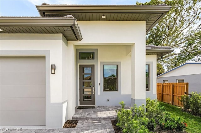 614 105th Ave N, Naples, FL 34108 - entrance to property with stucco siding and elevator