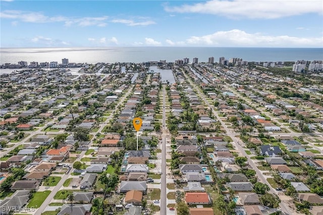 614 105th Ave N, Naples, FL 34108 - aerial view of property's location featuring a nearby body of water and nearby suburban area