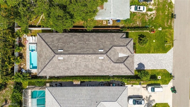 614 105th Ave N, Naples, FL 34108 - drone / aerial view of a pool area