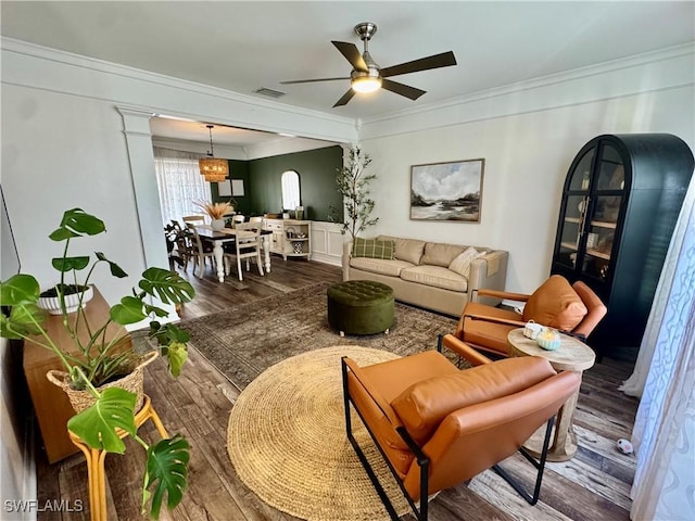 13356 Bristol Park Way, Fort Myers, FL 33913 - living room featuring wood finished floors, crown molding, ceiling fan, and a chandelier