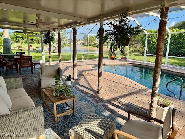 13356 Bristol Park Way, Fort Myers, FL 33913 - outdoor pool featuring ceiling fan, a patio area, and glass enclosure