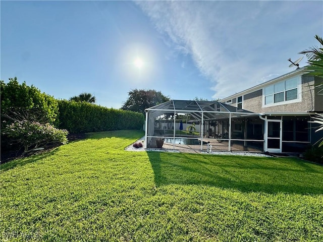 13356 Bristol Park Way, Fort Myers, FL 33913 - view of green lawn with a lanai