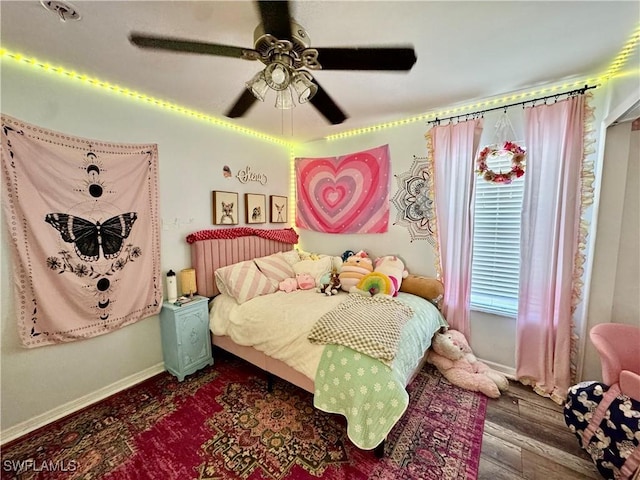 13356 Bristol Park Way, Fort Myers, FL 33913 - bedroom with a ceiling fan and dark wood-style flooring