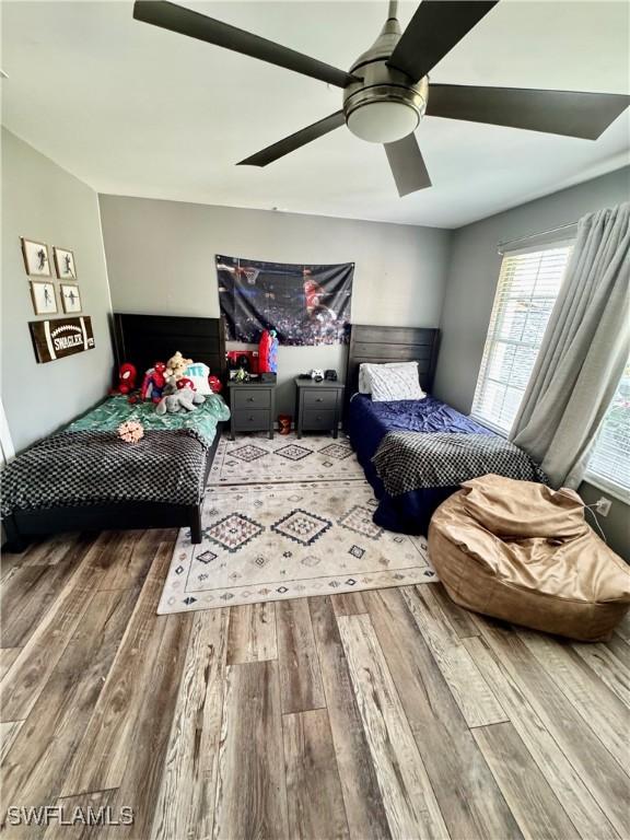 13356 Bristol Park Way, Fort Myers, FL 33913 - bedroom featuring wood finished floors and ceiling fan