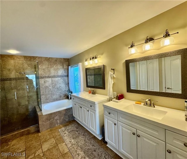 13356 Bristol Park Way, Fort Myers, FL 33913 - full bathroom with two vanities, a bath, and a stall shower