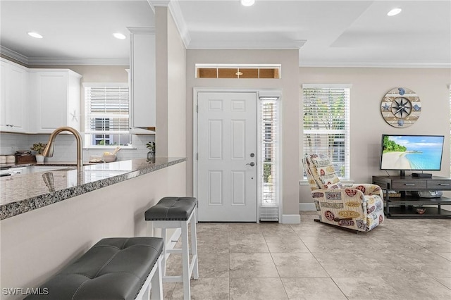 10406 Santiva Way, Fort Myers, FL 33908 - foyer featuring crown molding and recessed lighting
