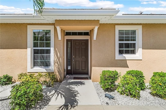 10406 Santiva Way, Fort Myers, FL 33908 - entrance to property with stucco siding