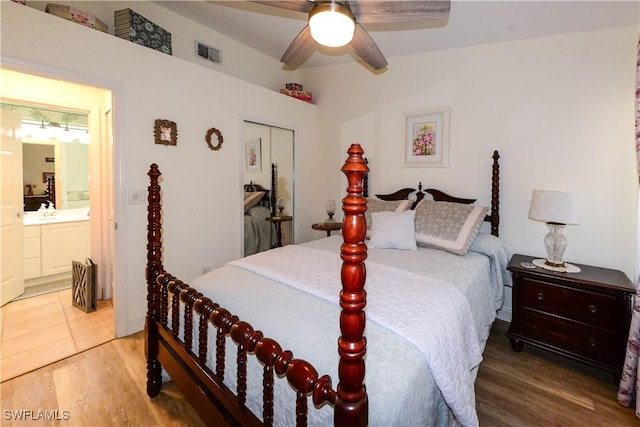 314 Melrose Pl Unit 33, Naples, FL 34104 - bedroom with light wood finished floors, connected bathroom, and a ceiling fan