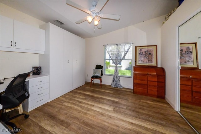 314 Melrose Pl Unit 33, Naples, FL 34104 - home office with wood finished floors, ceiling fan, and lofted ceiling