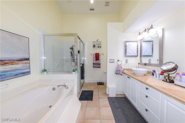 314 Melrose Pl Unit 33, Naples, FL 34104 - bathroom featuring tile patterned flooring, a shower stall, vanity, and a bath