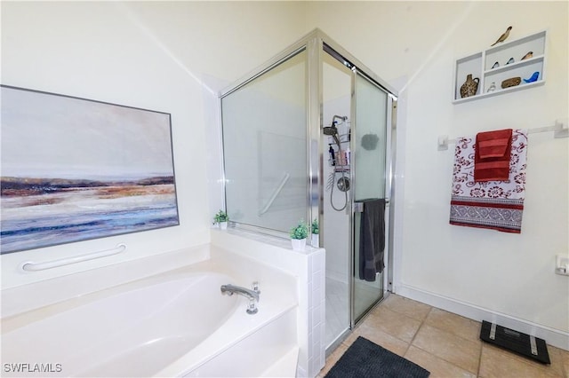 314 Melrose Pl Unit 33, Naples, FL 34104 - bathroom with a garden tub, a shower stall, and tile patterned flooring