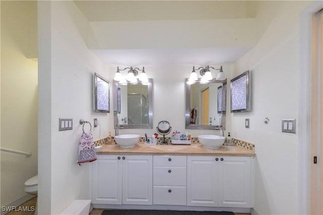314 Melrose Pl Unit 33, Naples, FL 34104 - bathroom featuring double vanity and toilet