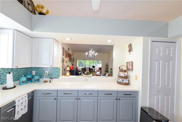 314 Melrose Pl Unit 33, Naples, FL 34104 - kitchen with gray cabinetry, a chandelier, stainless steel dishwasher, light countertops, and backsplash