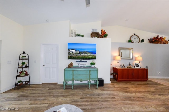 314 Melrose Pl Unit 33, Naples, FL 34104 - living room featuring wood finished floors and lofted ceiling