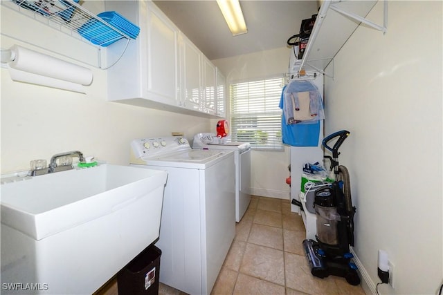 314 Melrose Pl Unit 33, Naples, FL 34104 - laundry area with cabinet space, independent washer and dryer, and light tile patterned flooring