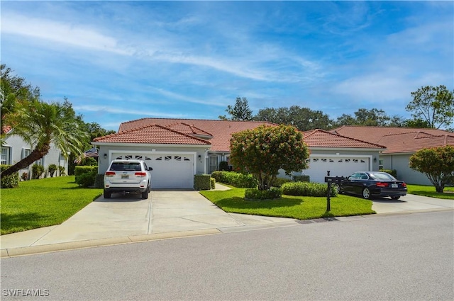314 Melrose Pl Unit 33, Naples, FL 34104 - mediterranean / spanish-style house featuring a garage, driveway, a front lawn, and a tile roof