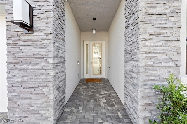 20368 Estero Crossing Blvd, Estero, FL 33928 - doorway to property featuring stucco siding