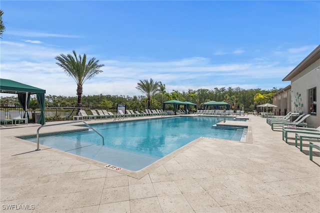 20368 Estero Crossing Blvd, Estero, FL 33928 - community pool with a patio and a gazebo