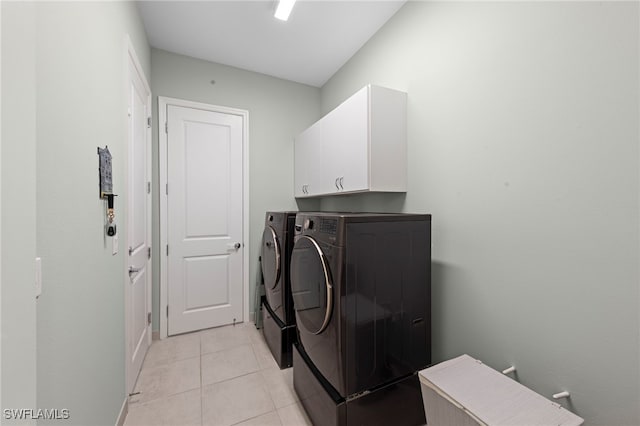 20368 Estero Crossing Blvd, Estero, FL 33928 - laundry area with separate washer and dryer, cabinet space, and light tile patterned floors
