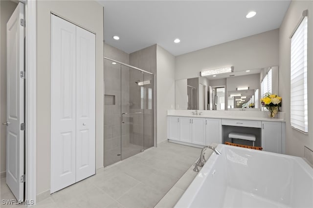 20368 Estero Crossing Blvd, Estero, FL 33928 - bathroom with a closet, a stall shower, vanity, a tub to relax in, and recessed lighting