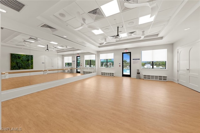 20368 Estero Crossing Blvd, Estero, FL 33928 - workout room with light wood-type flooring, plenty of natural light, a raised ceiling, and recessed lighting