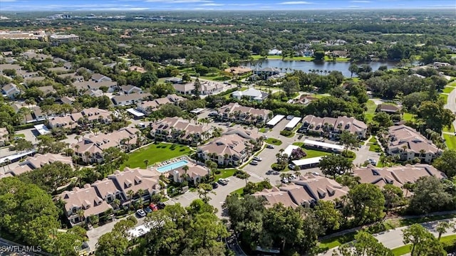 60 Emerald Woods Dr Unit B11, Naples, FL 34108 - aerial overview of property's location featuring nearby suburban area
