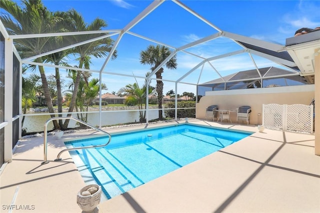 3128 Andorra Ct, Naples, FL 34109 - outdoor pool featuring a patio area, a water view, and glass enclosure
