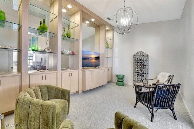 3128 Andorra Ct, Naples, FL 34109 - living area featuring light colored carpet, a chandelier, recessed lighting, and built in shelves